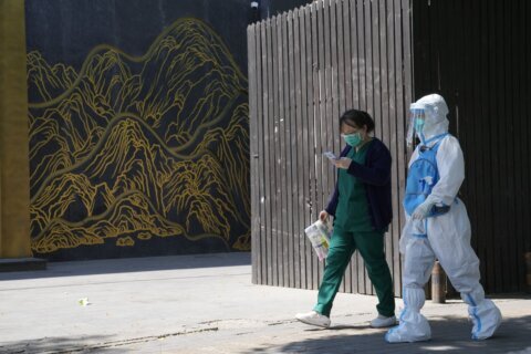 Shanghai says lockdown to ease as virus spread mostly ends