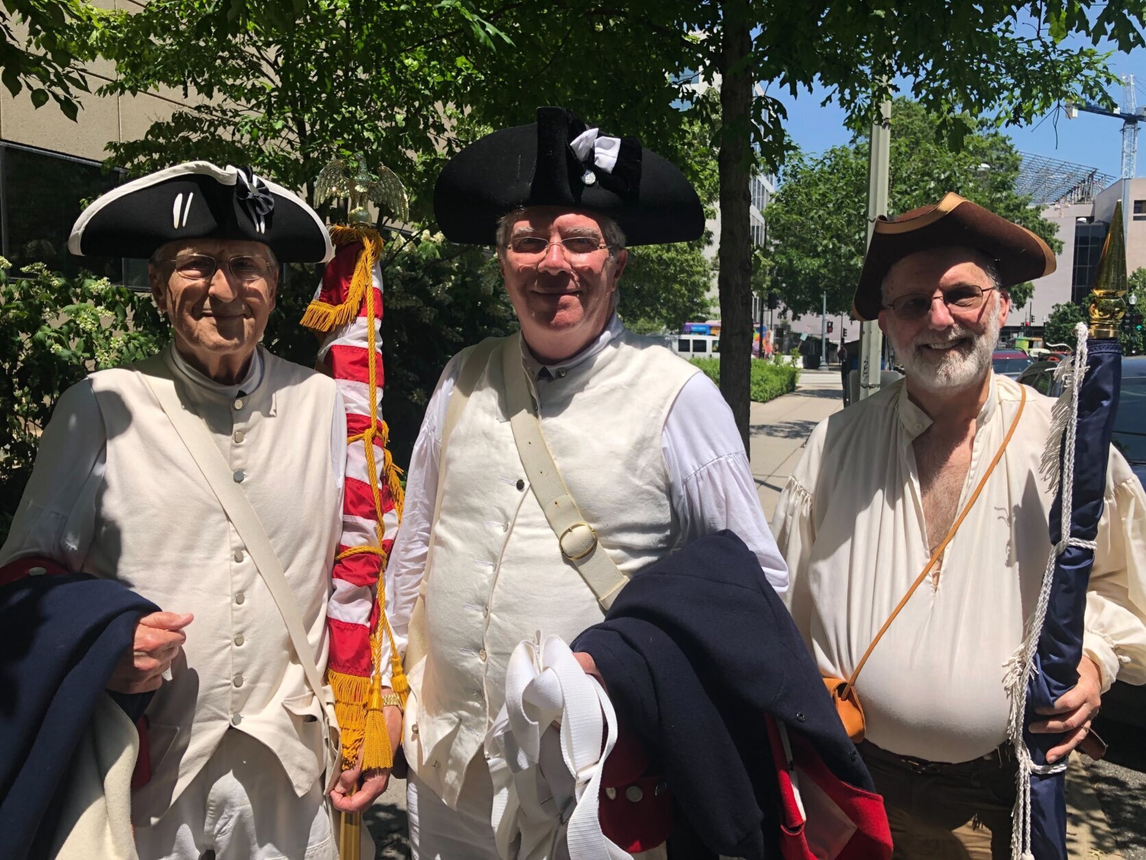Re-enactors from the Sons of the American Revolution braved the temperatures in authentic garb to march in Monday's parade.