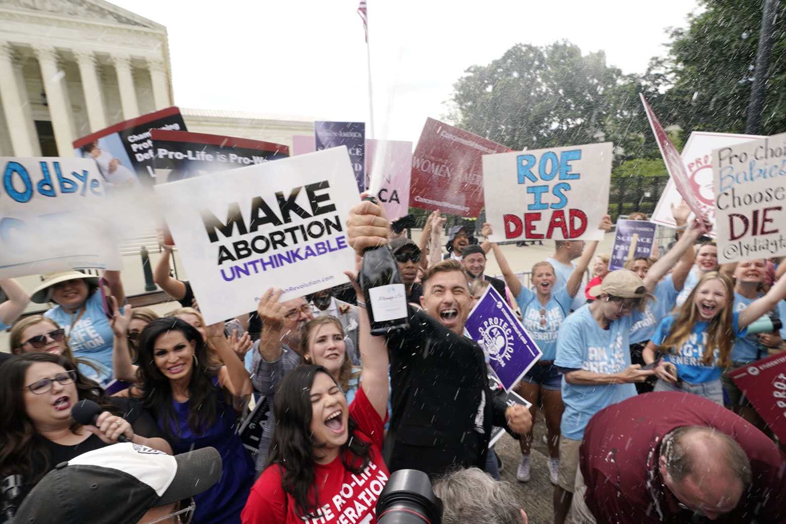 <p>A celebration outside the Supreme Court, Friday, June 24, 2022, in Washington. The Supreme Court has ended constitutional protections for abortion that had been in place nearly 50 years — a decision by its conservative majority to overturn the court&#8217;s landmark abortion cases. (AP Photo/Steve Helber)</p>
