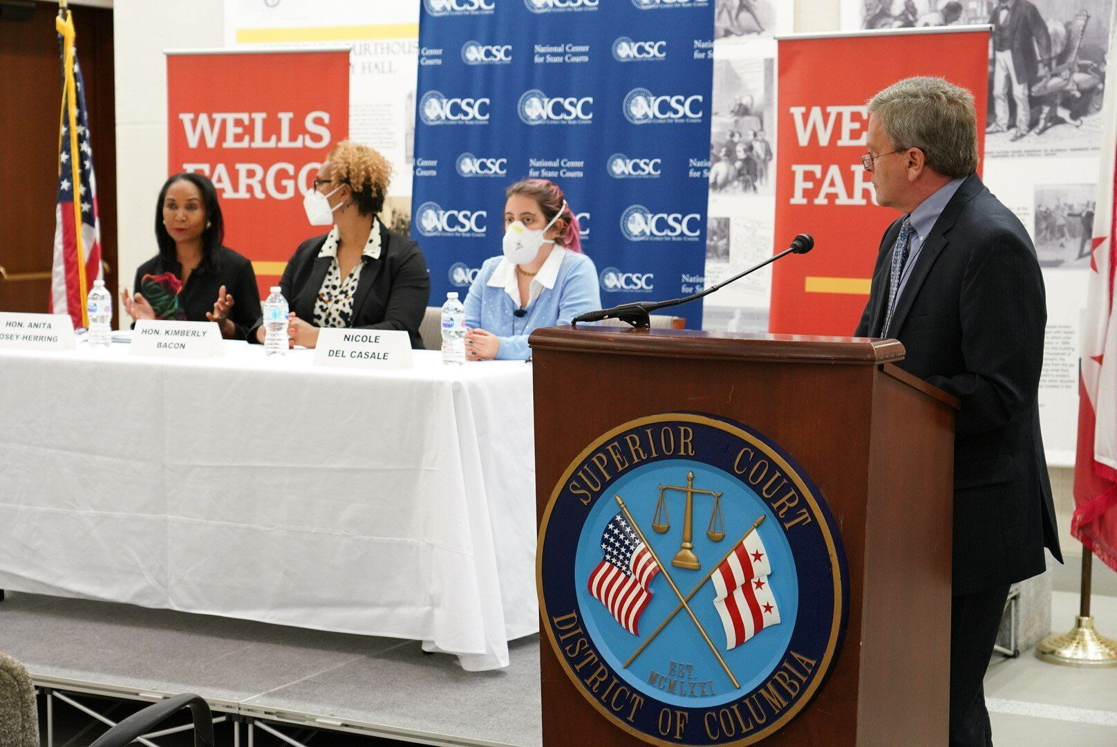 The National Center for State Courts (NCSC) announces a $10 million grant from the Wells Fargo Foundation alongside DC Court and National Center for State Courts representatives.