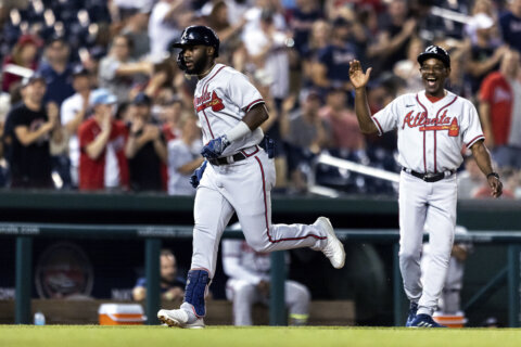 Braves hit five homers, beat Nats 10-4 for 13th straight win