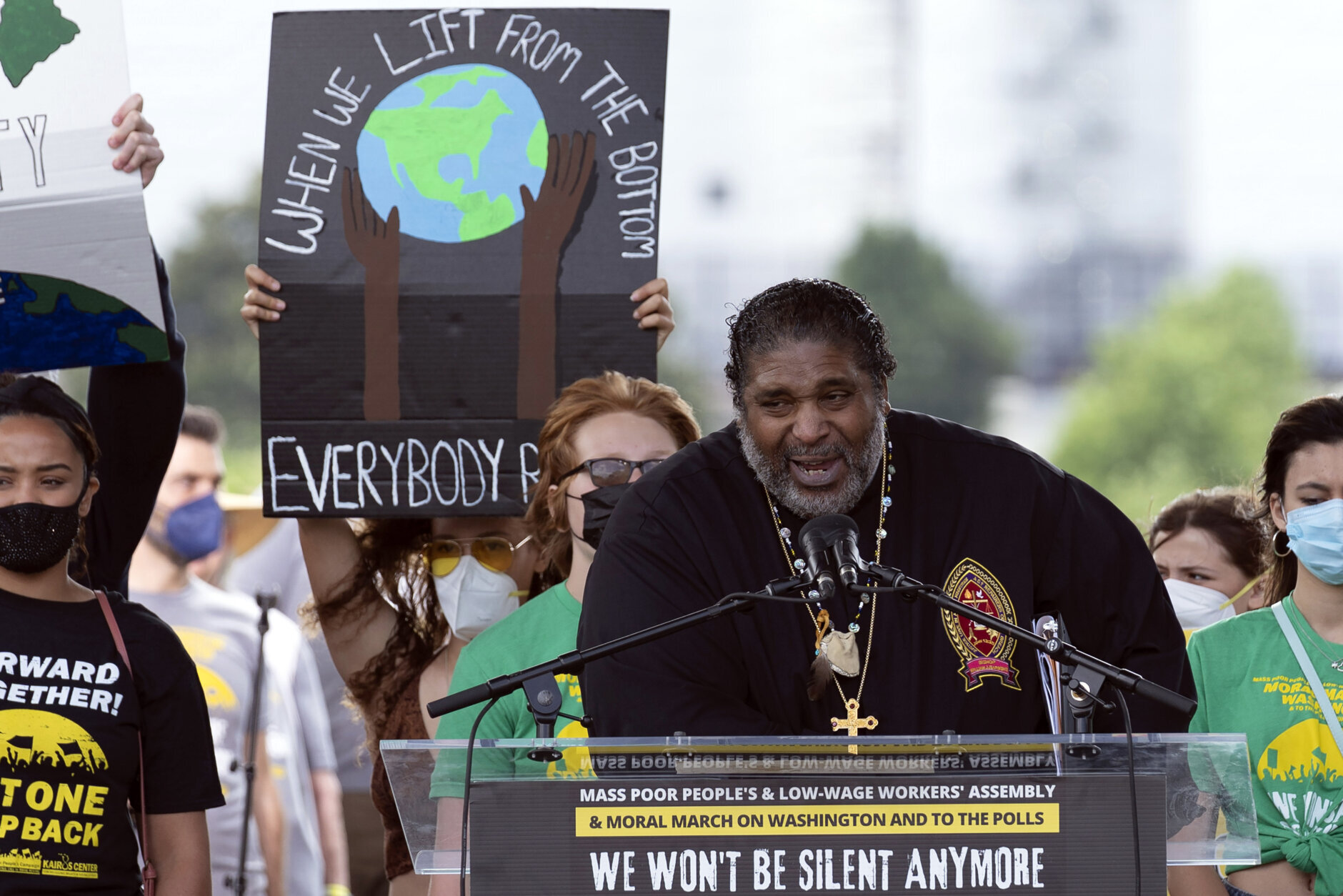 The Rev. William Barber speaks to the crowd during the Poor People's Campaign, "Moral March" rally on Pennsylvania Avenue in Washington, Saturday, June 18, 2022. (AP Photo/Jose Luis Magana)