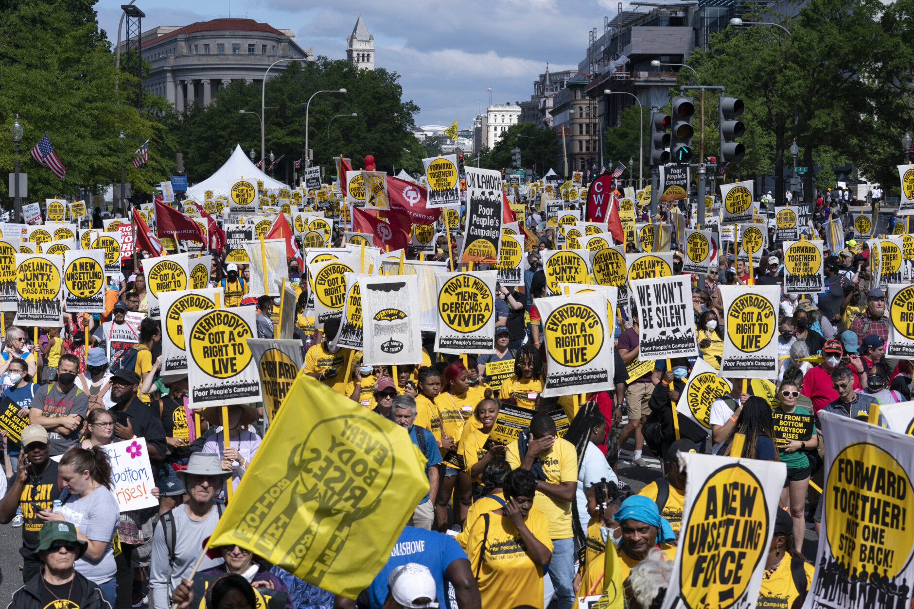Demonstrators rally during the Poor People's Campaign, "Moral March" on Pennsylvania Avenue in Washington, Saturday, June 18, 2022. (AP Photo/Jose Luis Magana)