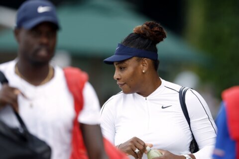 Serena Williams practices on Centre Court; 1st foe No. 113