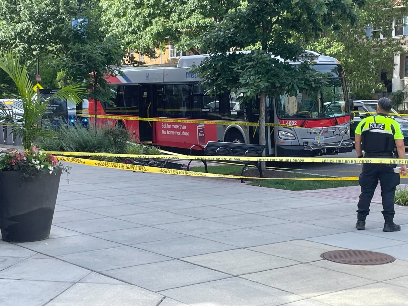 The Metro Transit Police are investigating a stabbing aboard a bus in Northwest D.C. Friday that left a man seriously hurt. (WTOP/Kyle Cooper)