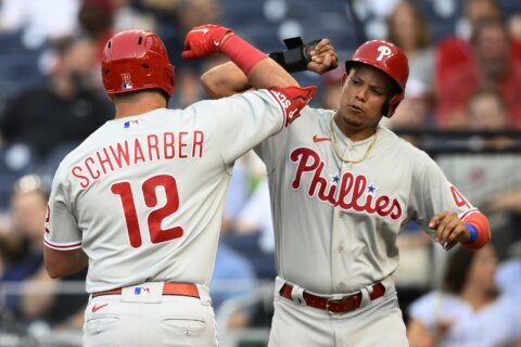 Schwarber hits 2 homers as Phils thump Nats, 12th win in 14
