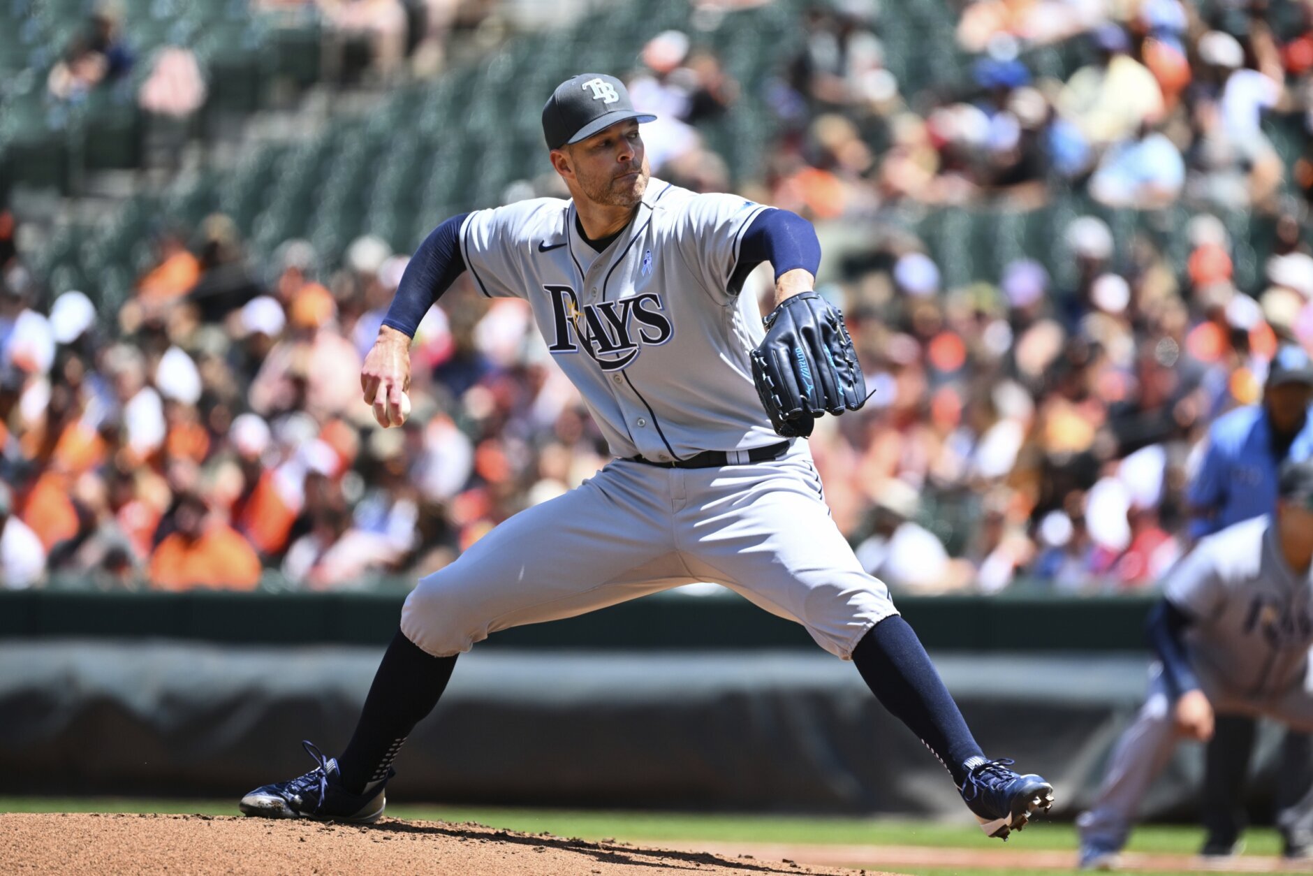 Tampa Bay Rays' Brett Phillips is greeted in the dugout after