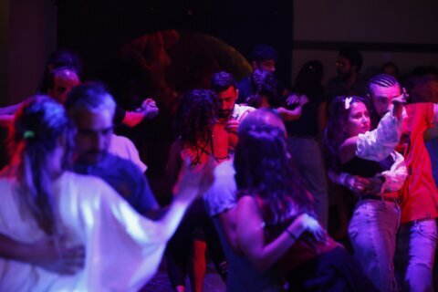 Away from war, Syrians find their rhythm in ballroom dancing