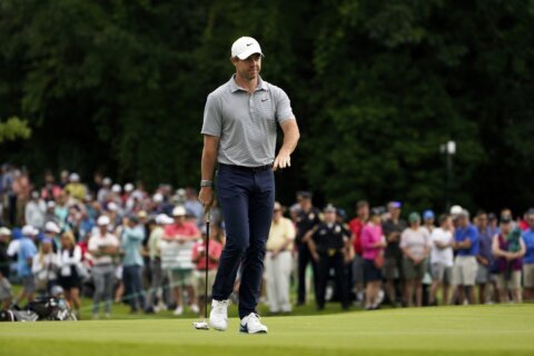 Rory McIlroy, JT Poston share Travelers lead at 8-under 62