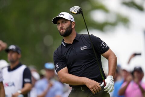 Wild drives, a stolen golf ball and happy finish for Rahm