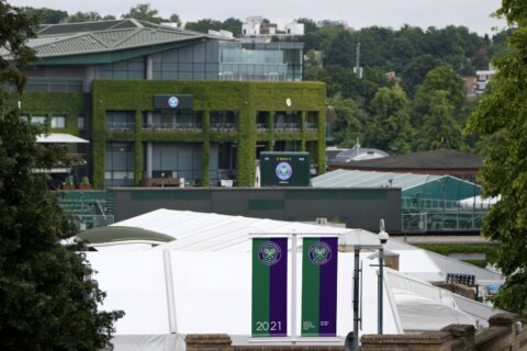 A short distance from Wimbledon, players struggle and strive to qualify for the main draw