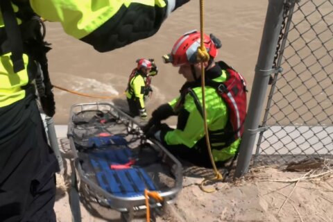 Migrant rescues along US-Mexico border climb amid sweltering heat and high water levels