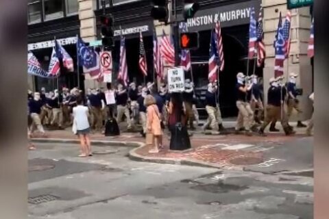 Group wielding White nationalist flags march along Boston’s Freedom Trail