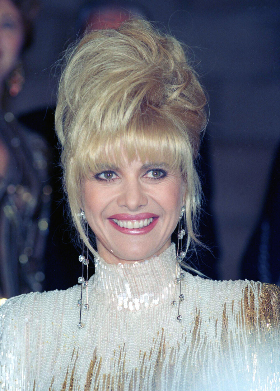 A radiant Ivana Trump smiles after she received her "Best 91" award during a gala reception at the Conciergerie in Paris, Dec. 12, 1991. She received the award for exemplifying the 1990s renaissance woman. (AP Photo/Jacques Brinon)