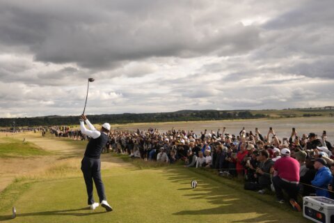 A rookie rises and Tiger crashes in slow-moving British Open