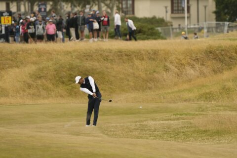 Dry conditions on course lead to slow play at British Open
