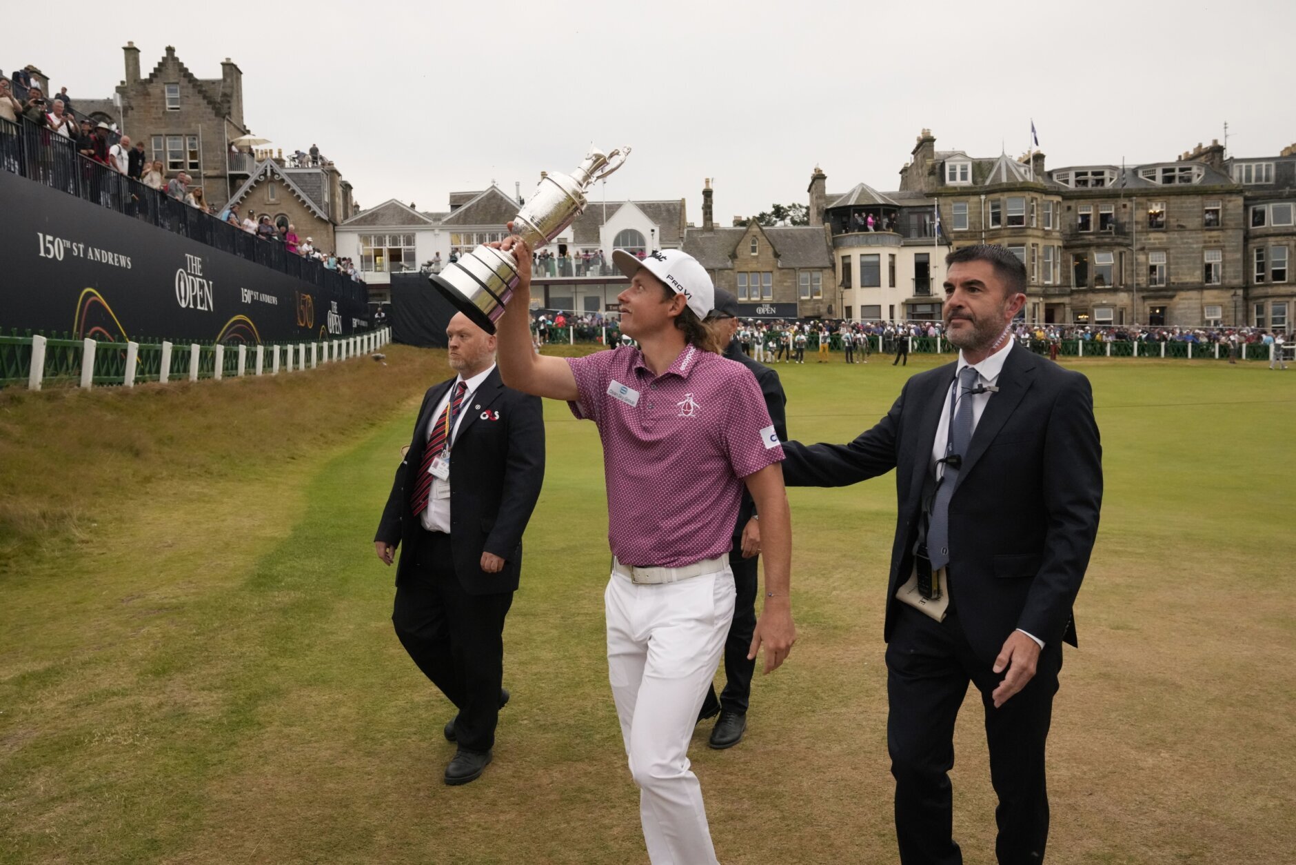 Cameron Smith, of Australia, holds the claret jug trophy after winning the British Open golf championship on the Old Course at St. Andrews, Scotland, Sunday July 17, 2022. (AP Photo/Gerald Herbert)