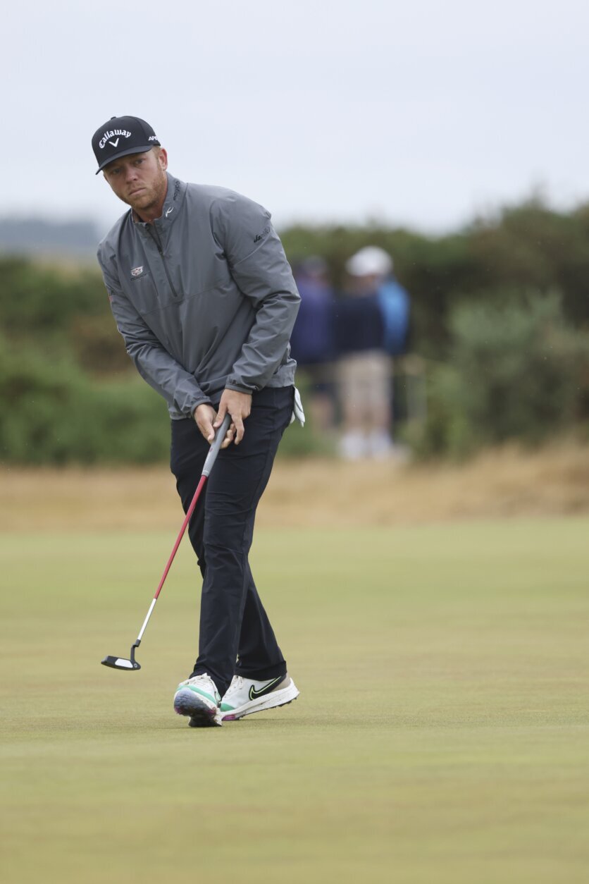 Talor Gooch of the US putts on the 9th green during the second round of the British Open golf championship on the Old Course at St. Andrews, Scotland, Friday July 15, 2022. The Open Championship returns to the home of golf on July 14-17, 2022, to celebrate the 150th edition of the sport's oldest championship, which dates to 1860 and was first played at St. Andrews in 1873. (AP Photo/Peter Morrison)