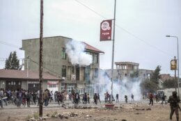 Residents protest against the United Nations peacekeeping force (MONUSCO) deployed in the Democratic Republic of the Congo in Goma Tuesday July 26, 2022. Demonstrators said they were protesting against the rise of insecurity and inaction of the UN in the region. (AP Photo/Moses Sawasawa)