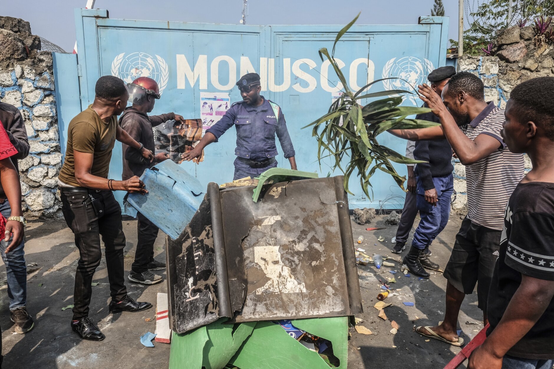 Residents protest against the United Nations peacekeeping force (MONUSCO) deployed in the Democratic Republic of the Congo, in Goma, Monday, July 25, 2022. Demonstrators said they were protesting against the rise of insecurity and inaction of the UN in the region. (AP Photo/Moses Sawasawa)