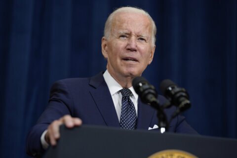 Biden emerges from COVID isolation, tells public: Get shots