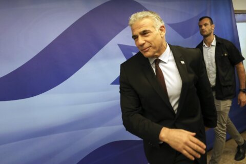 Israel’s Lapid meets Macron in Paris on first trip as PM