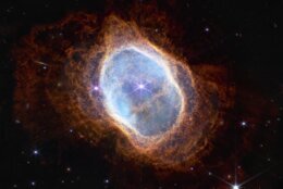 This image released by NASA on Tuesday, July 12, 2022, shows the bright star at the center of NGC 3132, the Southern Ring Nebula, for the first time in near-infrared light. (NASA, ESA, CSA, STScI via AP)