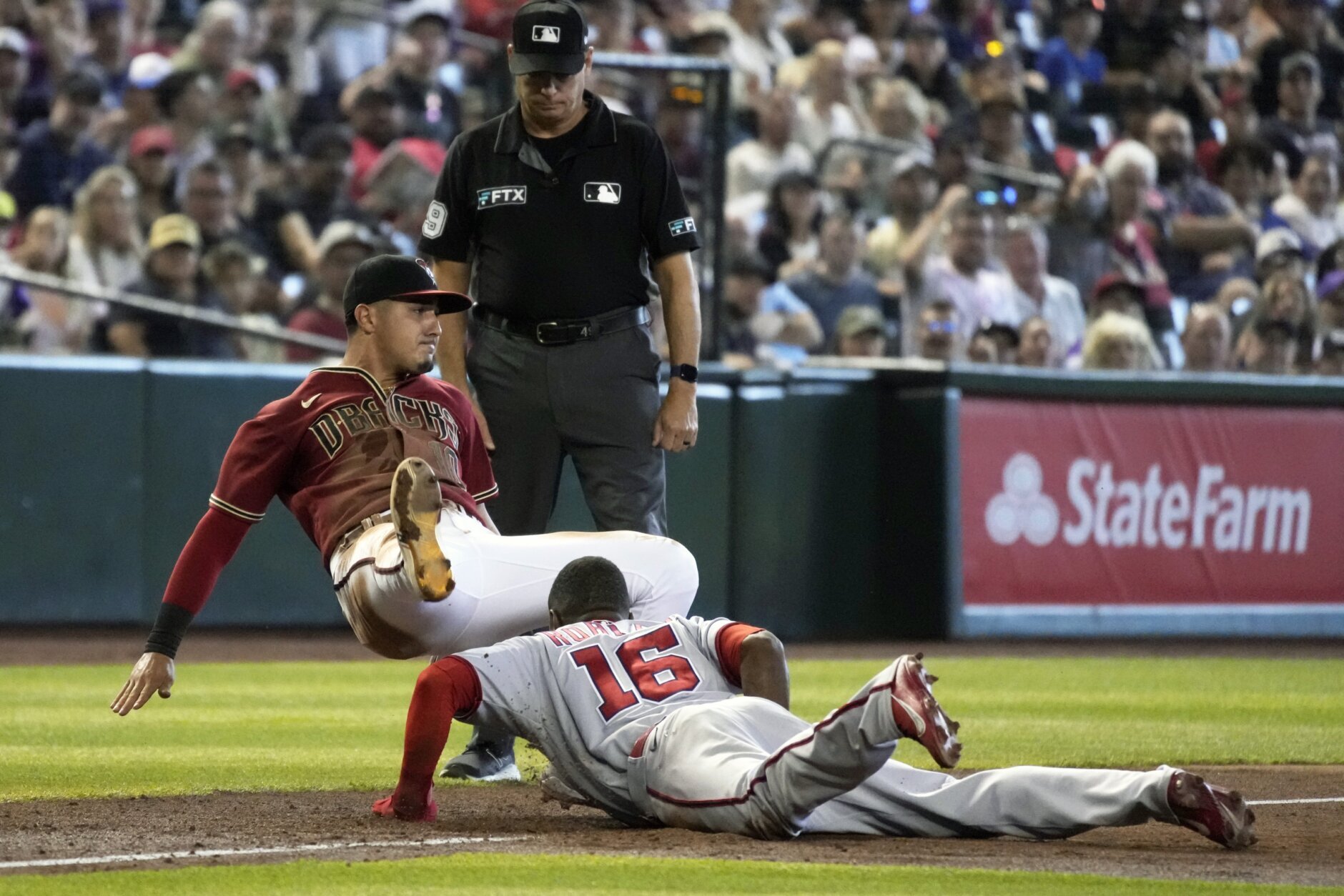 May 3 2022: Washington catcher Keibert Ruiz (20) gets a hit during the game  with Washington