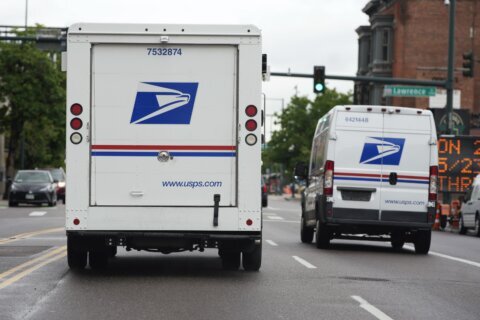 USPS ready for holiday crush after influx of mail-in ballots