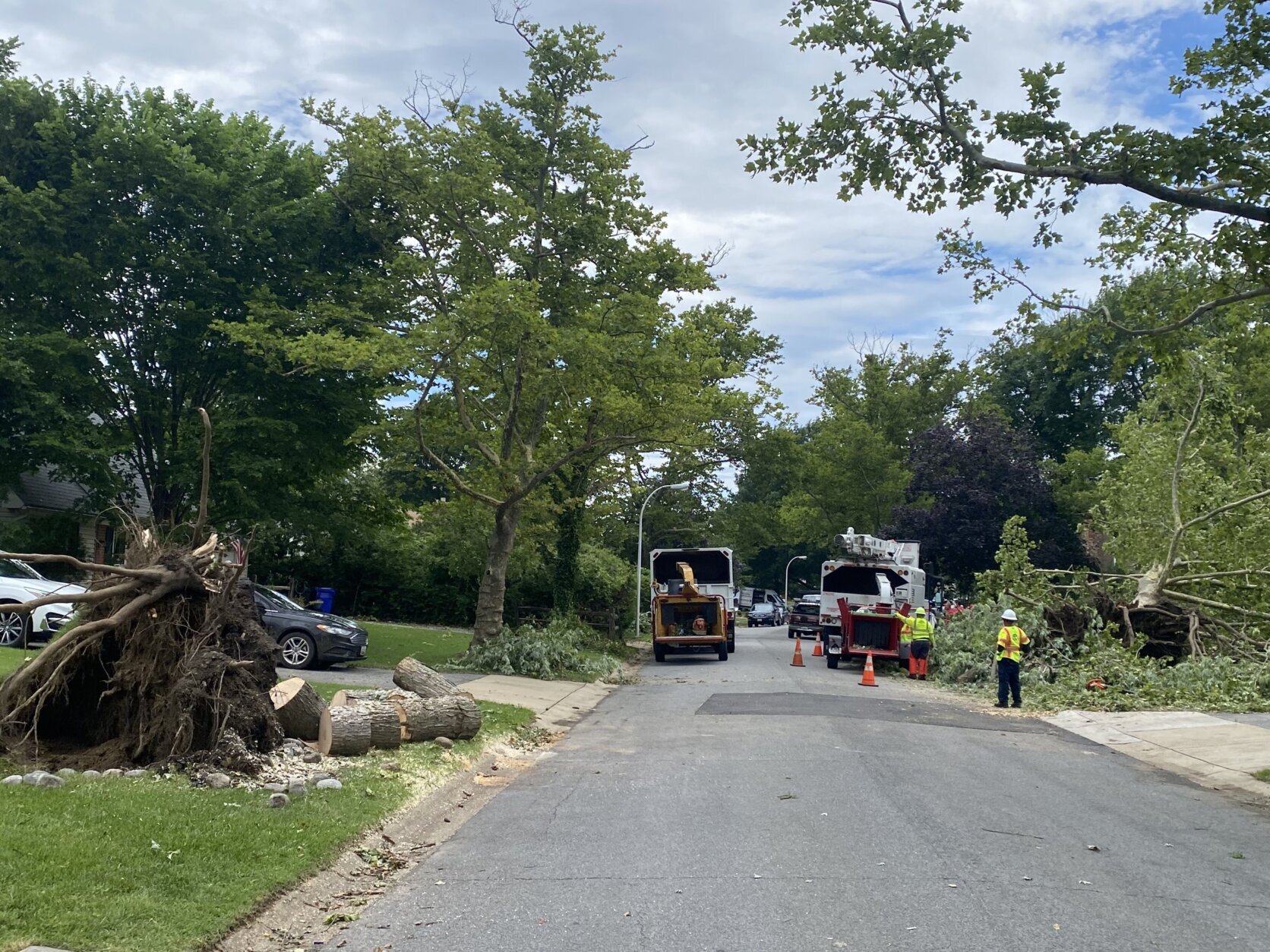 The cleanup was underway Wednesday in Bowie, Maryland, after Tuesday's storms downed trees and power lines and damaged some homes.