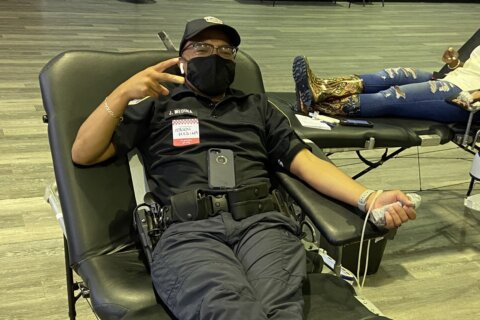 Help decide who wins DC’s ‘Battle of the Badges’ by donating blood