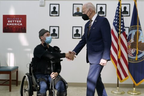 Biden signs ‘burn pits’ help for vets; a personal win, too