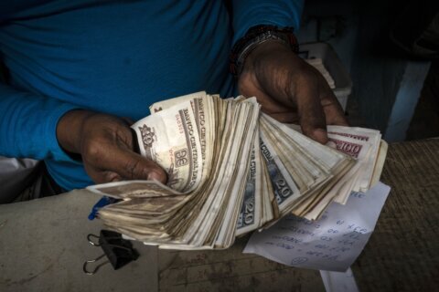 Cuban government starts selling dollars — with limits