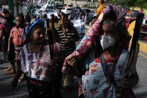 Guatemalans march in protest of corruption, cost of living