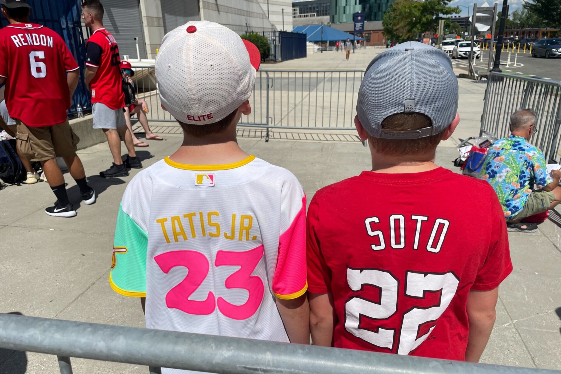 (L-R) Brandon, 11 and Hudson, 11, wait outside Nationals Park to see Juan Soto play. 