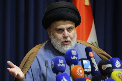 Iraq Shiite cleric behind parliament sit-in steps up demands