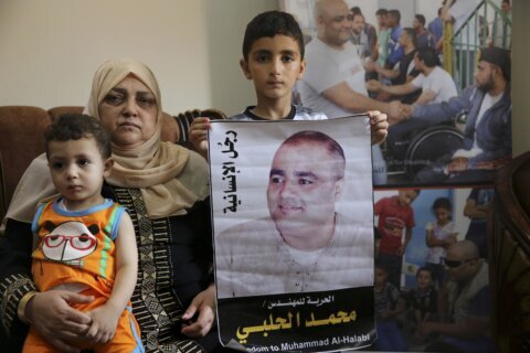 Gaza aid worker gets 12 years on Israeli terror charges