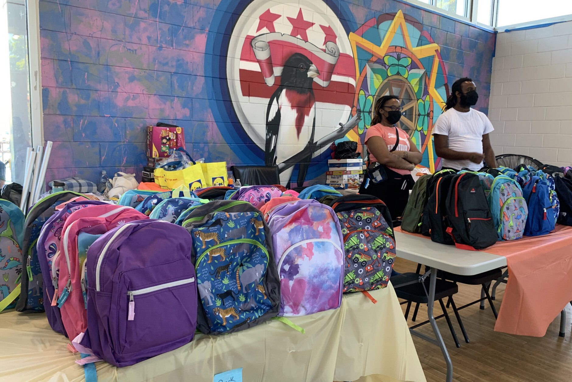 Backpack giveaway gets DC kids ready for school while honoring an old