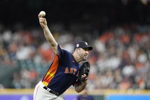 Verlander exits early, Astros hold on for 3-1 win over O’s