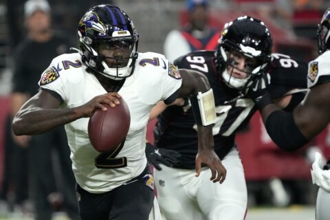 Huntley, Likely shine as Ravens beat Cardinals 24-17