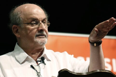 Salman Rushdie ‘on the road to recovery,’ agent says