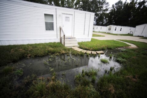 In towns plagued by raw sewage, EPA promises relief