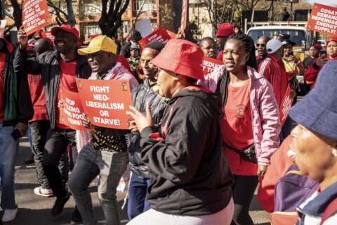 South African workers march in capital against inflation