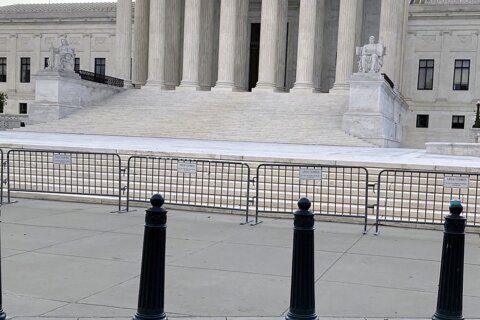 Supreme Court fencing removed, but building remains closed