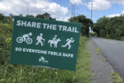 A 'share the trail' sign on the W&OD trail.