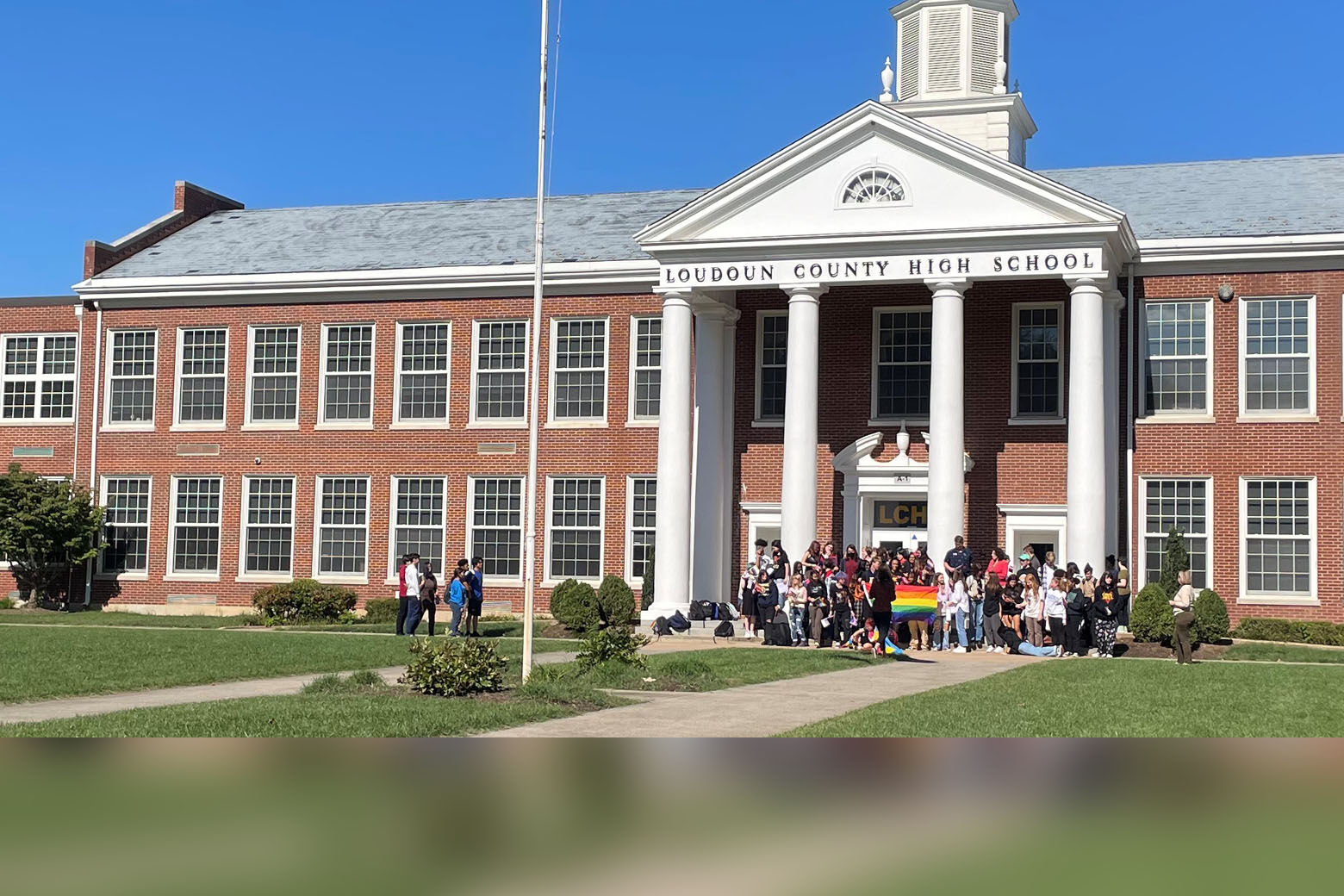 Students in Loudoun County, Virginia, walk out in protest of new transgender student policies announced by Gov. Glenn Youngkin. (WTOP/Neal Augenstein)