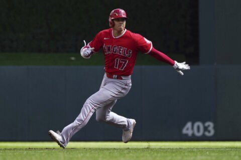 Trout homers, doubles twice as Angels beat Twins 10-3