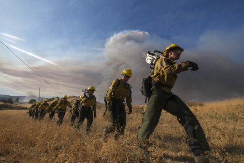 Crews face heat wave along with California wildfires