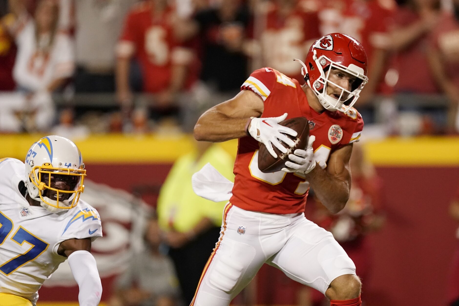 Kansas City Chiefs wide receiver Justin Watson (84) celebrates his  touchdown catch with teammate Jerick McKinnon (