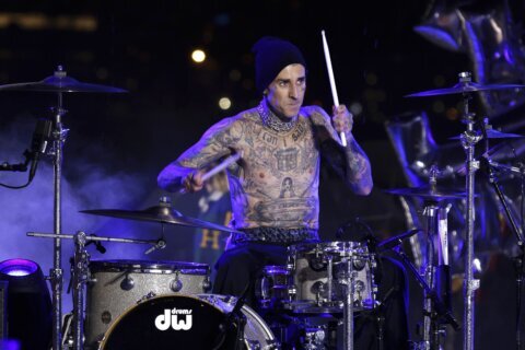 Tommy Hilfiger closes bold show with Travis Barker on drums